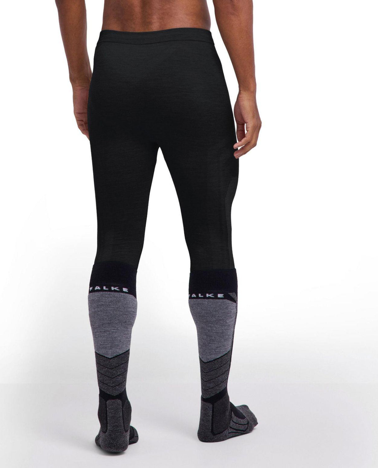 Bakifrånvy av Falke Wool-Tech Light 3/4 Tights för herr i svart färg, kombinerat med skidstrumpor.