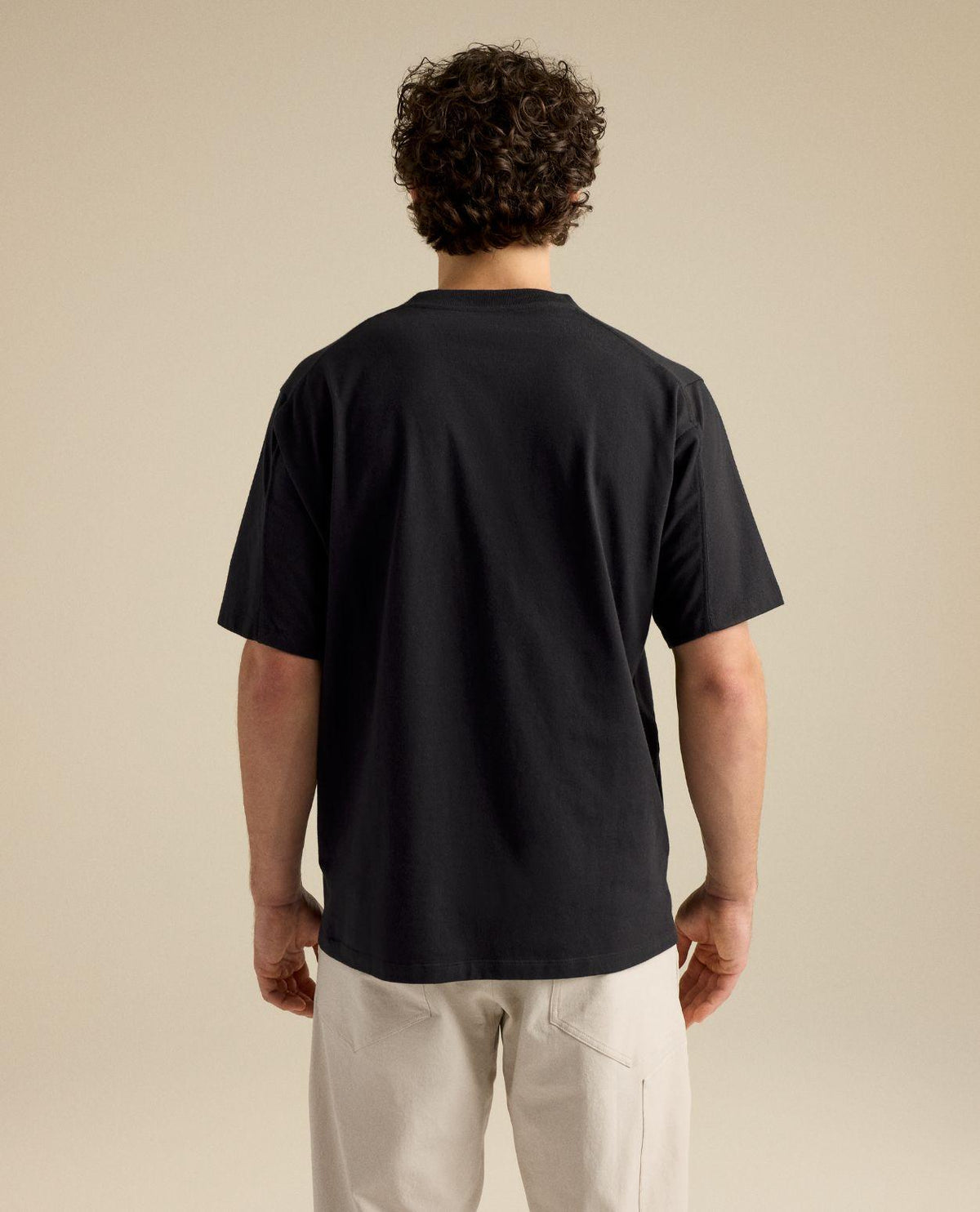 Arc'teryx Kragg Cotton Emblem Crew SS Men - Svart t-shirt bakifrån - Alpingaraget