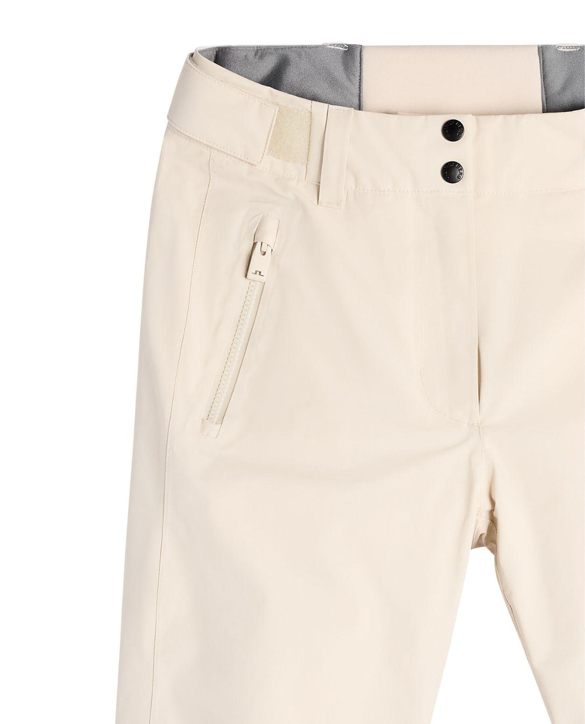 Närbild på midja och dragkedjeficka på J.Lindeberg Elara Pant Women i färgen Moonbeam Beige.