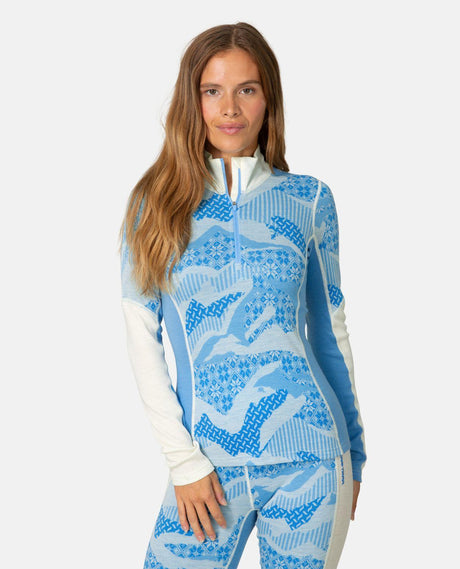 Kari Traa Olea Half Zip i blått med mönster för damer, perfekt underställ i merinoull för kalla dagar i skidbacken.