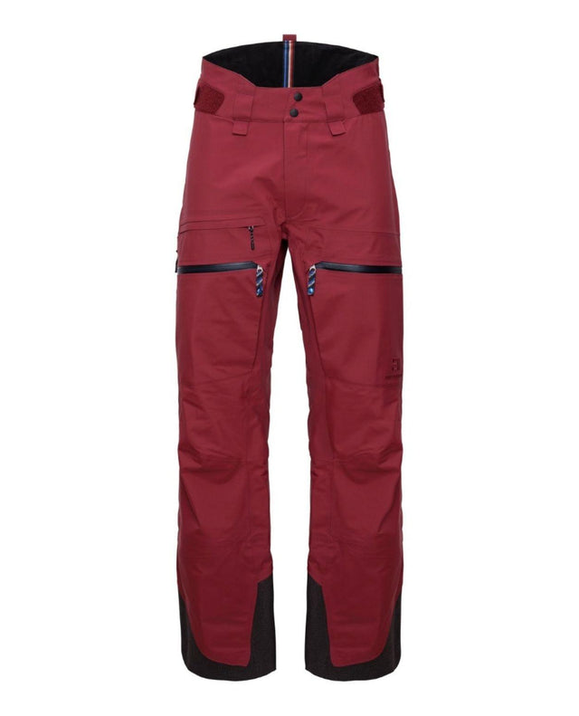 Elevenate Pure Pants Men - Tibetan Red skidbyxor för herr i rött med praktiska fickor och förstärkta benslut.
