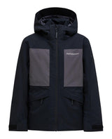 Peak Performance Gravity Insulated Jacket Junior i svart och motion grey för unga skidåkare.