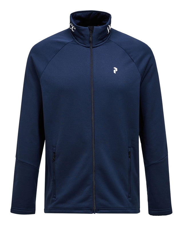 Peak Performance Rider Essentials Zip Jacket för herrar i blå shadow, ett funktionellt mellanlager för skidåkning.