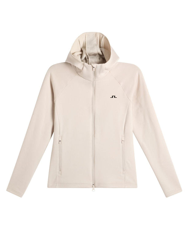 J.Lindeberg Portia Polartec Hood Dam - Beige mellanlager med huva och dragkedja.