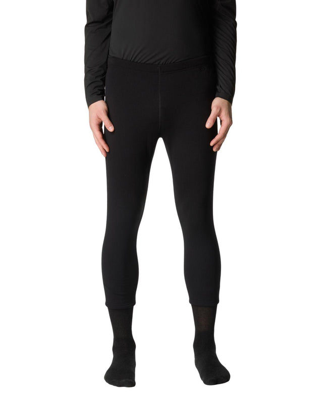 En person bär svarta Houdini Drop Knee Power Tights II underställsbyxor för herrar.