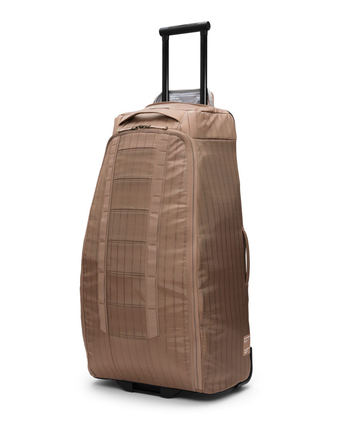 D_b_ Hugger Roller Bag 90L i färgen Affogato Brown, en brun resväska med teleskophandtag och hjul för skidresan.