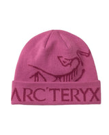 Arc'teryx Bird Word Toque - Rosa stickad mössa med logotyp för sköna dagar på berget.