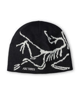 Arc'teryx Bird Head Toque - Svart mössa med stickad fågelgrafik i vitt för sköna dagar på berget.