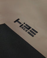 Peak Performance Edge 3L AOP Bib Pants - Detaljbild på HiPE-logotyp och material