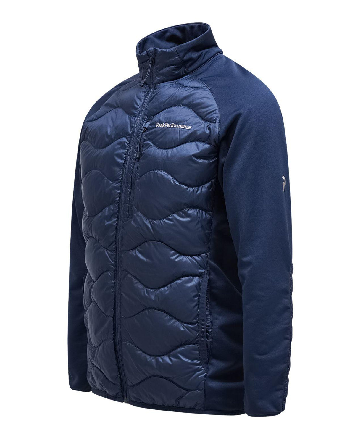 Peak Performance Helium Down Hybrid Jacket för herrar i färgen blue shadow, visad i en sidovy med quiltad front.