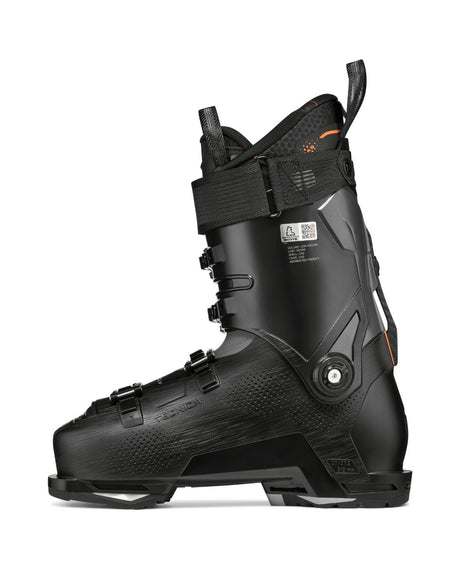 Tecnica Mach1 LV 120 TD2 alpinpjäxa från sidan i svart utförande med orangea detaljer.