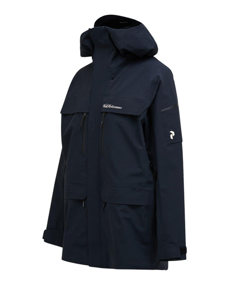 Peak Performance 40Y R&D Long Gore-Tex Shell Jacket Men i svart, visad i sidovinkel.