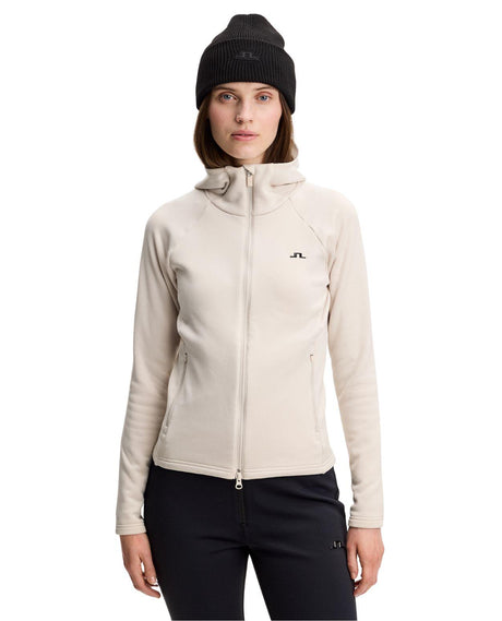 J.Lindeberg Portia Polartec Hood Women i färgen Moonbeam beige - Mellanlager för dam