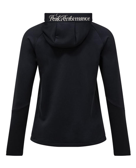 Peak Performance 40Y Rider Zip Hood Women i svart visas bakifrån med fokus på den tryckta huvan.