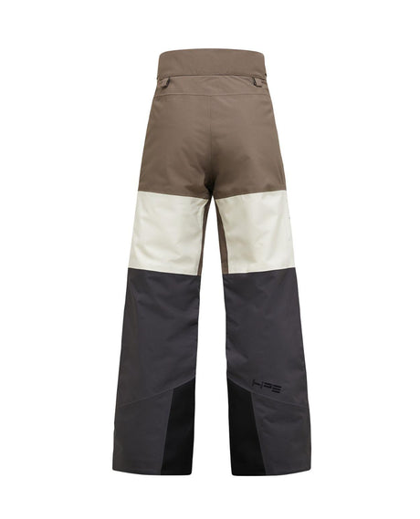 Peak Performance Gravity Insulated Pants Junior i färgerna Terrain Tan och Sand Fog sett bakifrån.