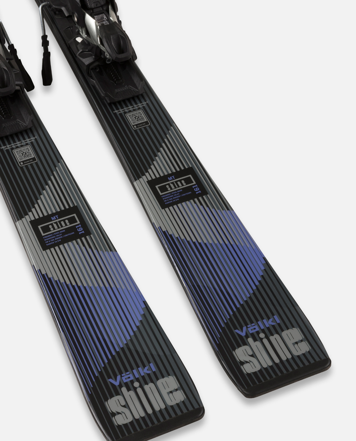 Närbild på Völkl Shine MT pistskidor med vMotion 10 GW-bindningar och stilren design.