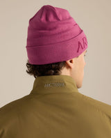 Rosa Arc'teryx Bird Word Toque mössa sedd bakifrån.