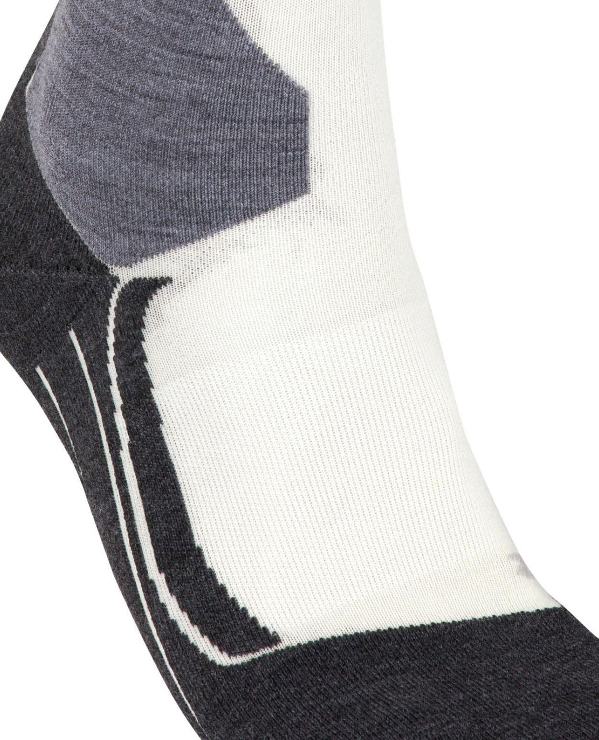 Falke SK4 Advanced Women skidstrumpa i off-white och grått som visar detaljer vid hälpartiet.