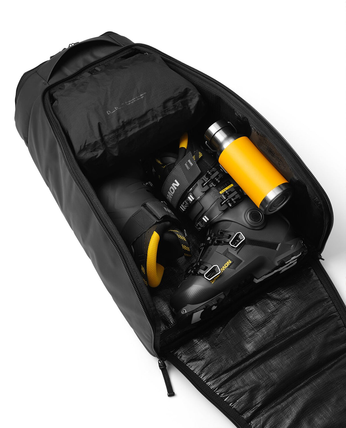 D_b_ Hugger Bootpack 45L - Black Out 